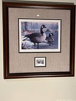 Framed print with stamp, front view