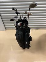 Full golf bag with clubs visible