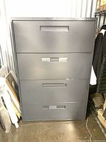 Full front view of grey 4-drawer file cabinet