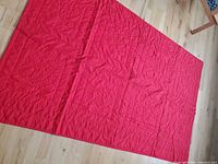 Reverse side of quilt, solid red