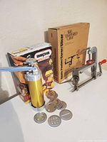 Cookie press, discs and apple peeler with boxes