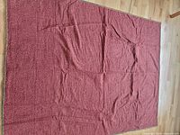 Reverse side red patterned fabric