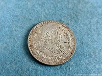 Obverse showing bust of Morelos and wreath