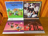 Group shot of all four album covers