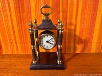 Full front view of Bombay Company pavilion mantel clock