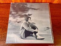 Front album jacket showing black-and-white artist photo