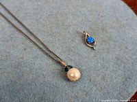 Opal pendant, pearl pendant on chain overview