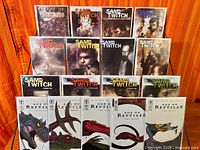 Full lot of 17 comic books displayed on rack
