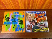 Both album covers side by side showing titles and overall condition