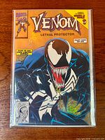 Front view of Venom: Lethal Protector #1 gold foil cover in bag