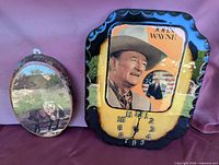 Wooden wall clock and oval wood slice plaque side by side