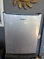 Front view showing Whirlpool logo and stainless front