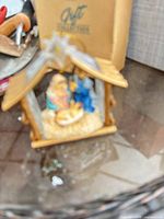 Front view of nativity set inside stable