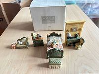 All miniature furniture pieces displayed with Avon Collectibles box