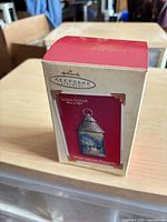 Front of Hallmark Keepsake box showing ornament image and branding