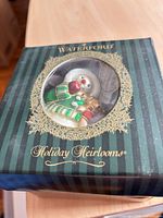 Box front showing Waterford Holiday Heirlooms window with ornament inside