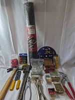 Group shot showing entire assortment including roll, tools, hardware and blade
