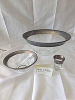 All three glass pieces arranged together showing size comparison