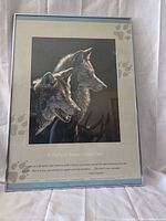 Full view of framed wolf print with mat and metal frame