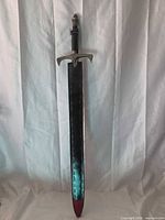 Full view of sheathed sword
