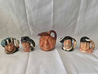 Front view of all five jugs