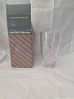 Vase beside original box, front view