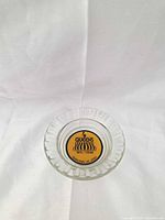 Top view showing logo and ribbed edge