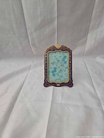 Front view of cloisonné picture frame