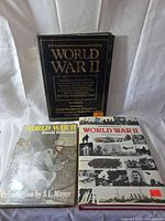 Front group view of all three World War II hardcover books