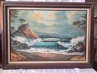 Full view of framed seascape painting