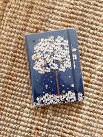 Front cover of sealed Falling Blossoms journal