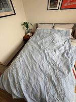 Duvet cover spread on bed displaying full pattern and color