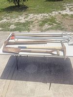 Overview of all five garden tools on table