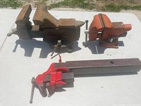 All three vises/clamp displayed on table