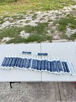 Group of sealant tubes arranged on table