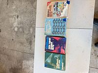 Group shot of all four Chilton manuals laid out on table