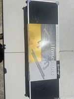 Closed carry case with product sleeve showing set details