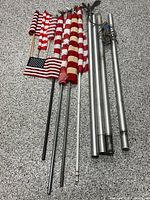 All poles and flags laid out showing quantity and condition