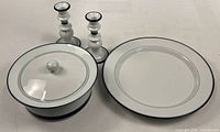 All four items: platter, covered dish, two candlesticks