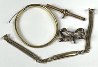 Group shot showing all four gold-filled pieces