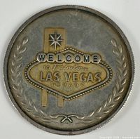 Obverse of coin showing Welcome to Fabulous Las Vegas sign
