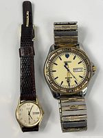 Both Seiko wristwatches side by side showing overall appearance and size comparison