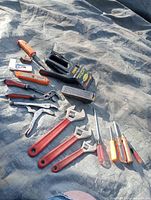 Group shot of all tools on tarp