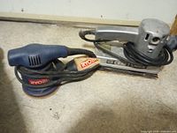 Ryobi orbital sander and Craftsman sheet sander with cords and sanding pads