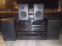 Front view showing Pioneer receiver, Pioneer CD player and four Infinity speakers