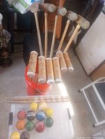 Overall view showing all mallets, balls and stakes
