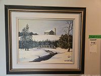 Full view of framed painting showing artwork, frame and signature placement