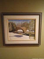 Full view of framed painting on wall