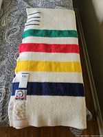 Folded Hudson's Bay blanket showing full stripe pattern and labels
