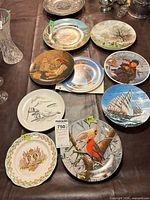 Overview of all nine plates on table